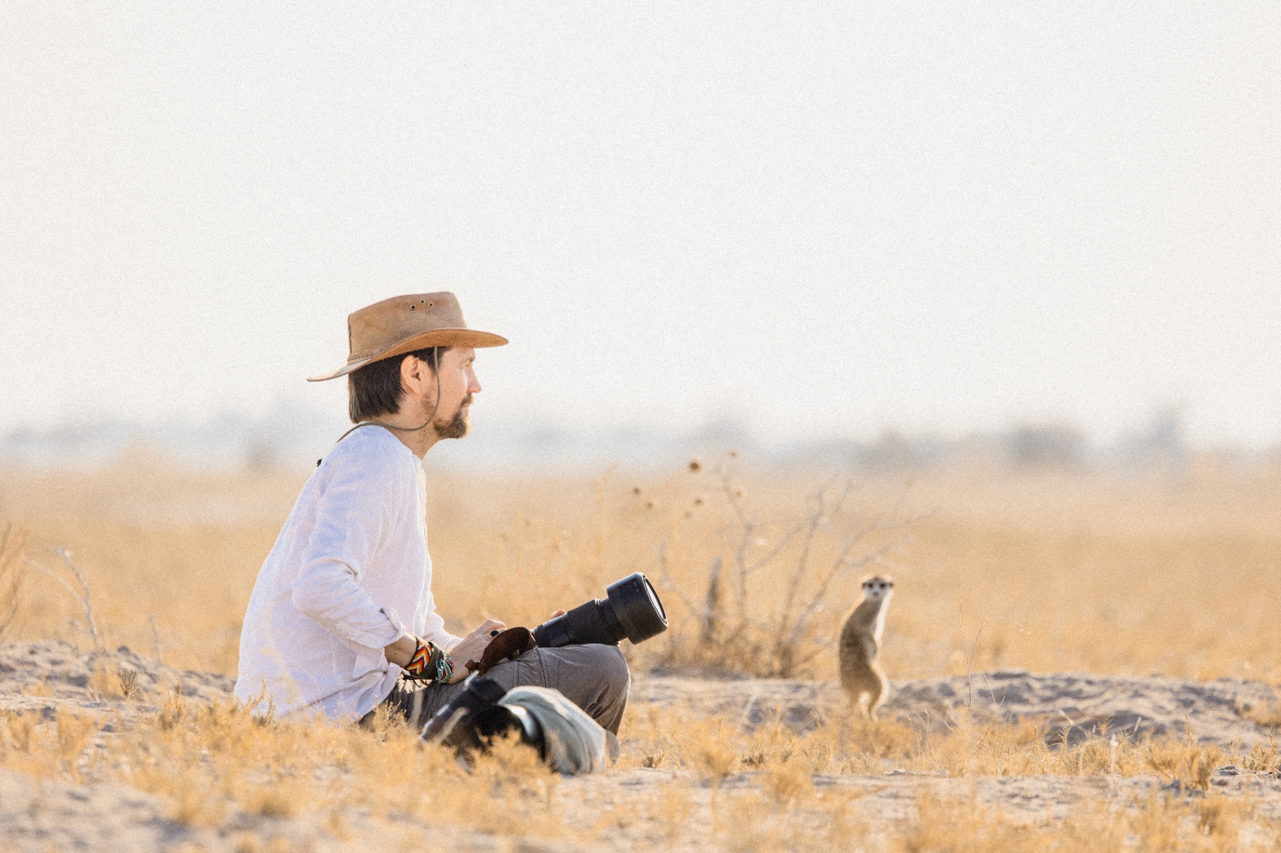 Justin with meerkats in the Makgadikgadi Pans