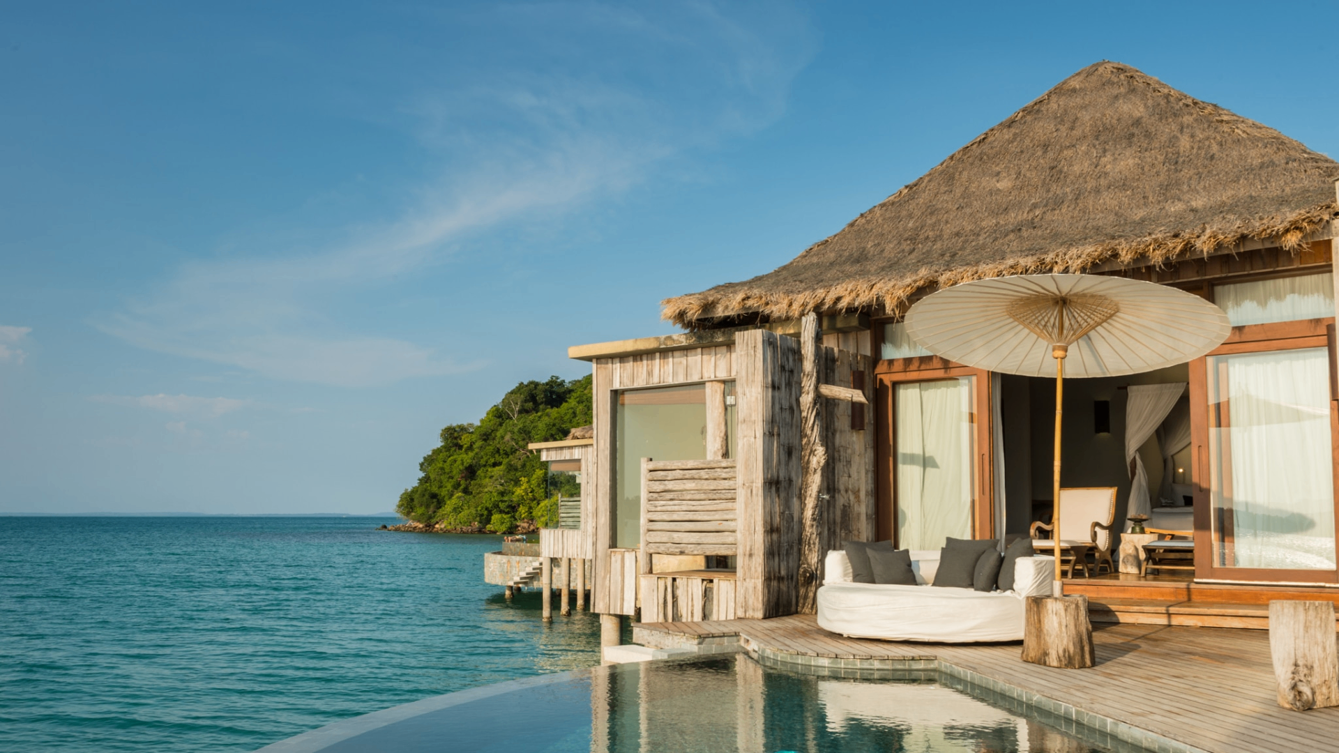 Overwater villa with thatched roof at Song Saa