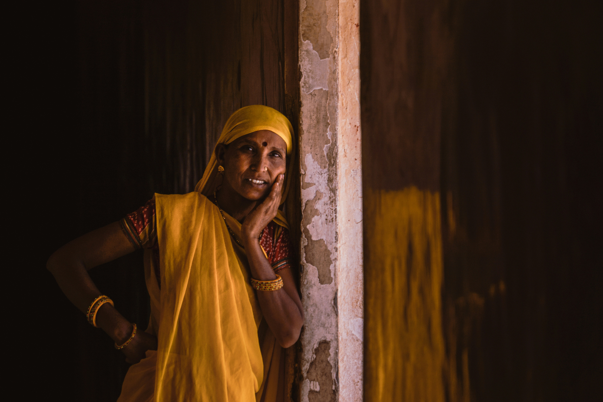 Woman in a saffron sari, Rajasthan