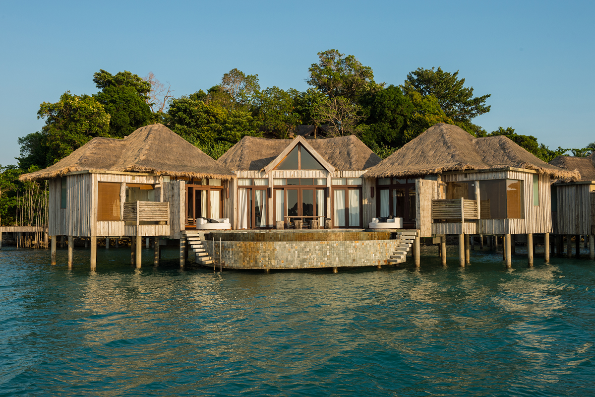 Overwater villa front at golden hour