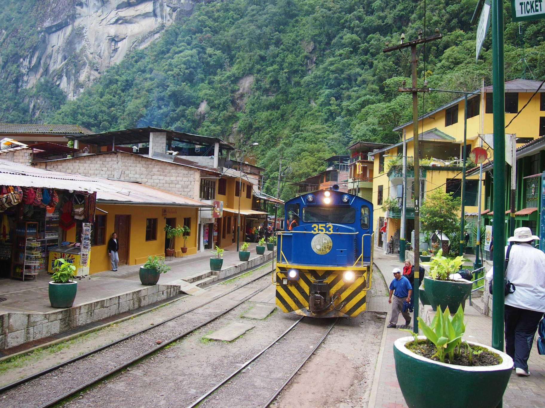 PeruRail train arriving at the Ollantaytambo station beside El Albergue, gateway to Machu Picchu