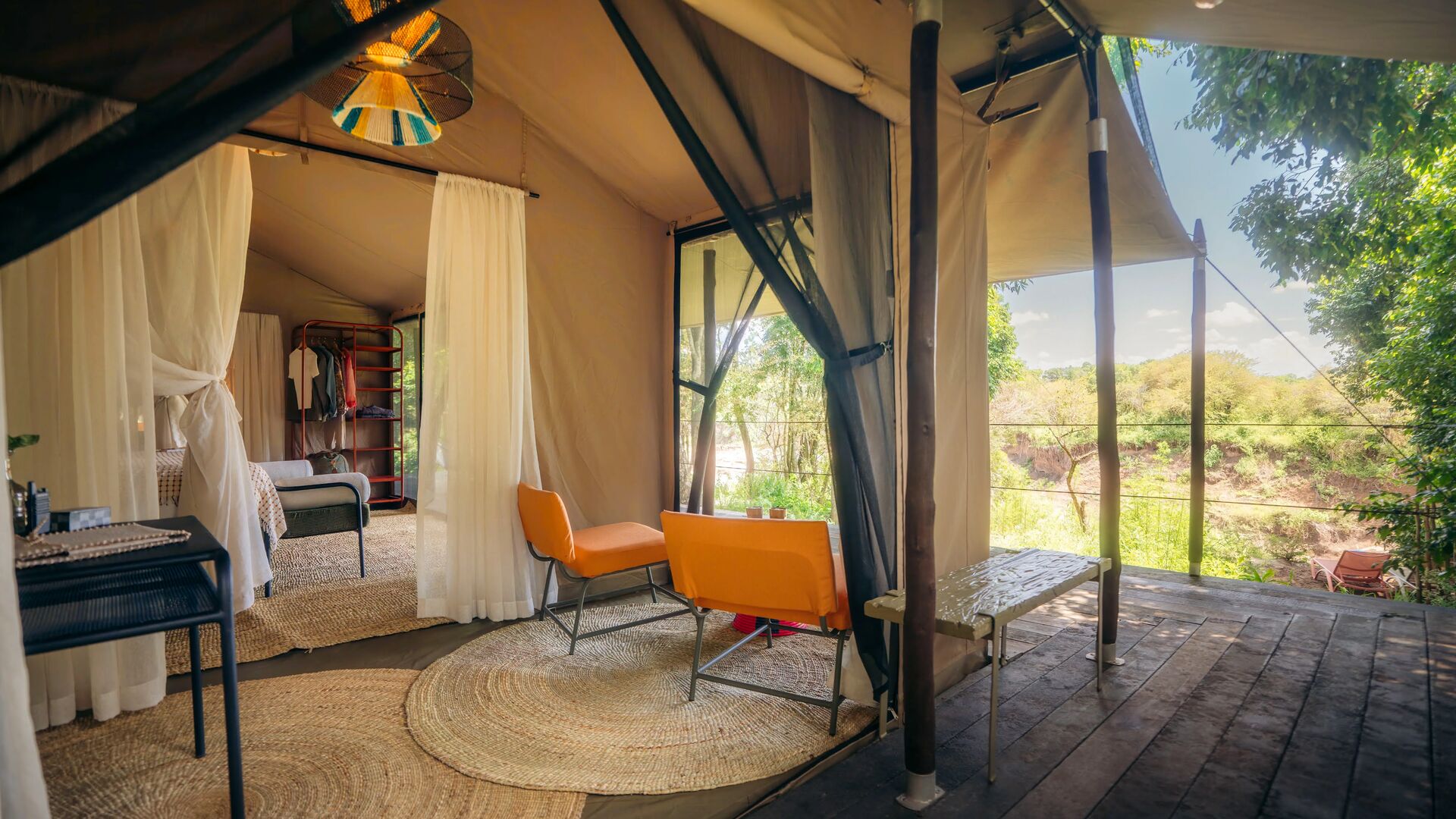 Tented room opening to the bush