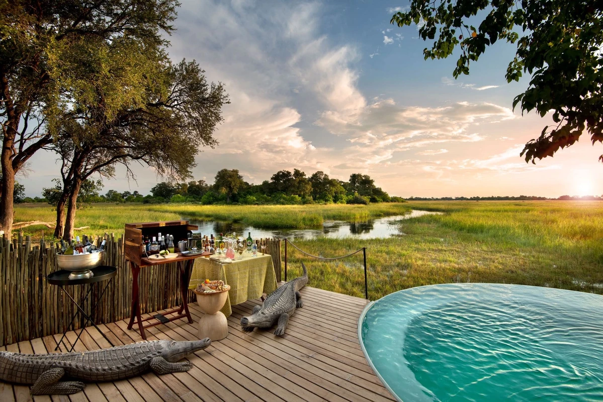 Pool deck overlooking the Okavango Delta at sunset