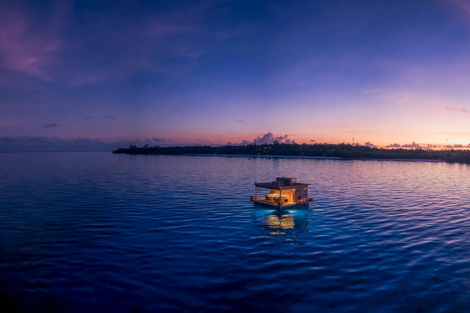 The underwater room glowing at sunset