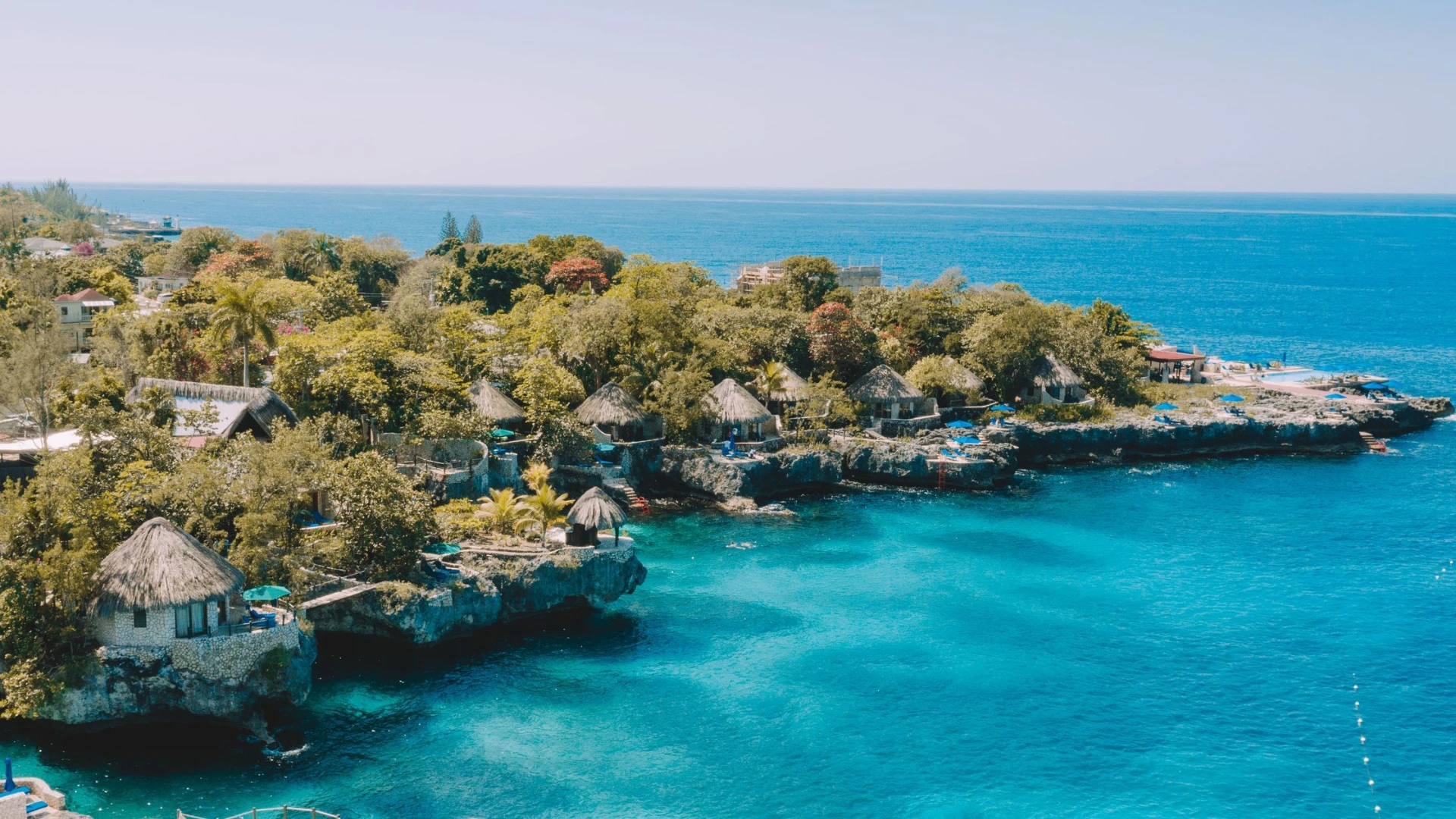 Rockhouse Hotel cliffside cottages over turquoise Caribbean sea