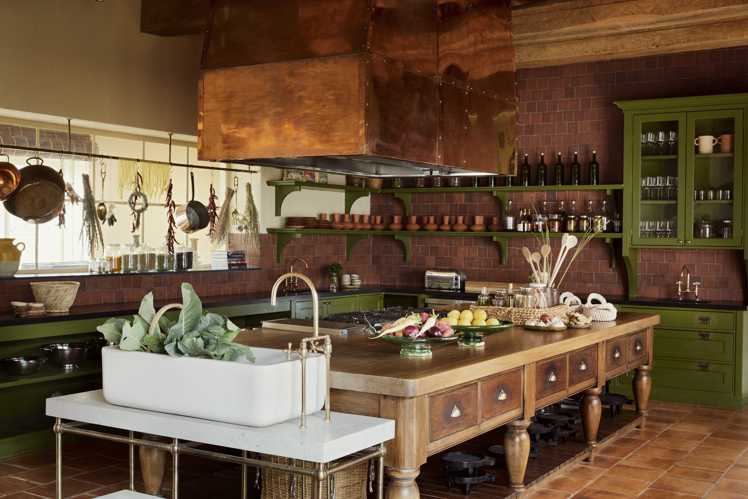 Artisan copper kitchen with farm-fresh produce