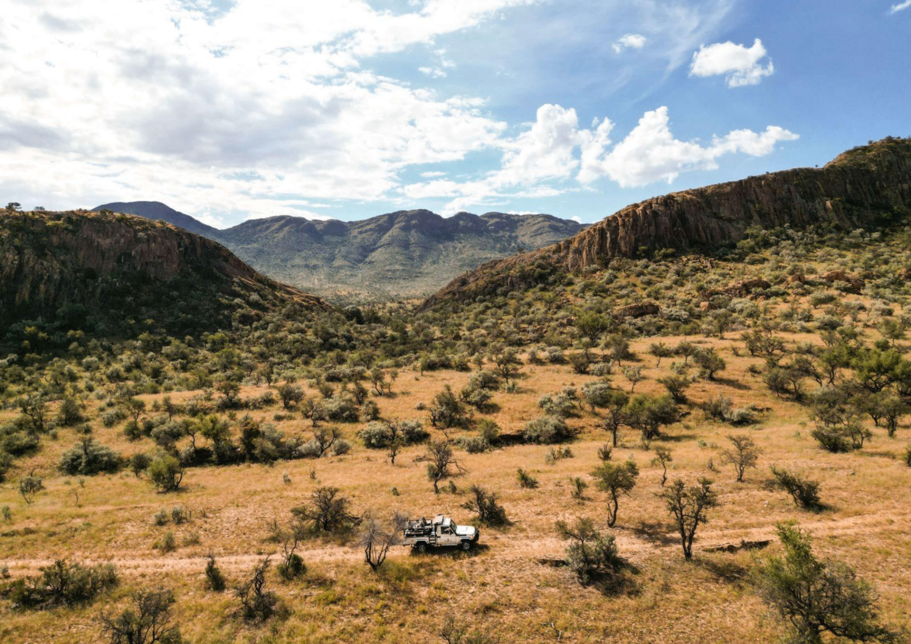 Game drive through Namibian mountain landscape
